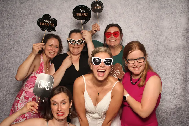 Bride and friends on the Silver Glitter backdrop