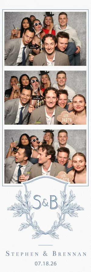 Niagara-on-the-Lake wedding photo strip: a big group of guests crowded in with props